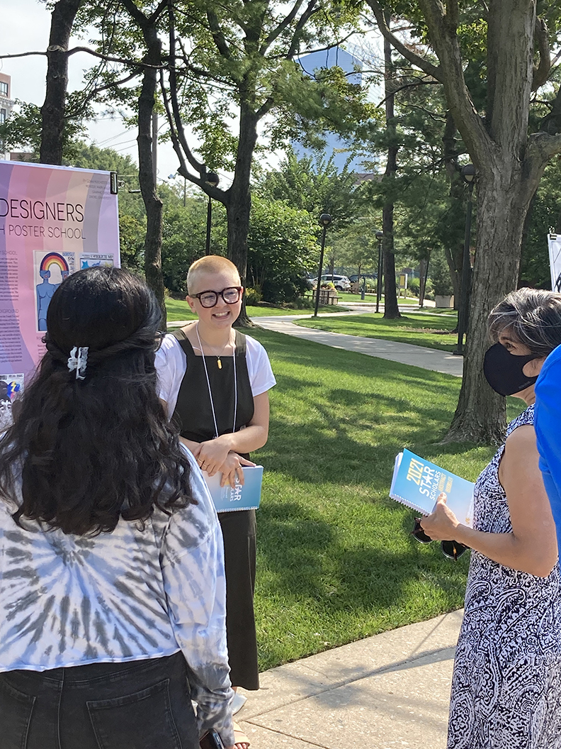 First-year Graphic Design student Cora Hochstetler presenting at STAR Scholars Showcase